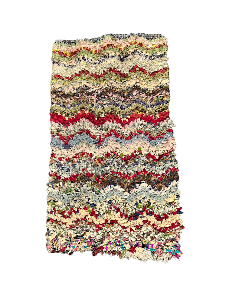 Marokkanske multifarvede Boucherouite-tæppe.